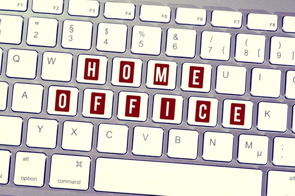 Illustration of the word home office superimposed on a computer keyboard